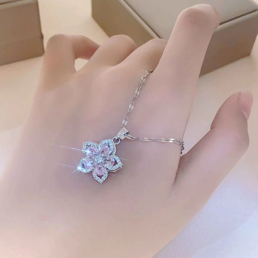 Spinning Flower with Silver Plated Chain Pendant